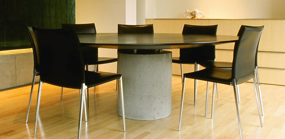 <p>Lense Table</p><p>2004</p><p>Cutom designed as a Dining Table for a residence designed by Bing Thom.</p><p>The top is solid hardwood, stained, supported by a cast concrete base, with stainless steel posts, and a flush rotating centre.</p><p>Height 28'' Diameter 7'-0''</p>